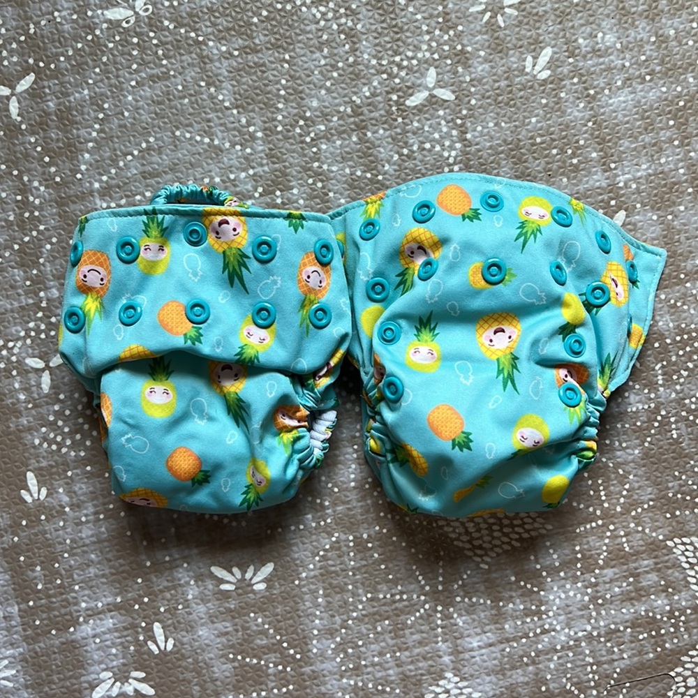 2 Newborn all in one (AIO) cloth diapers - pineapples, blue